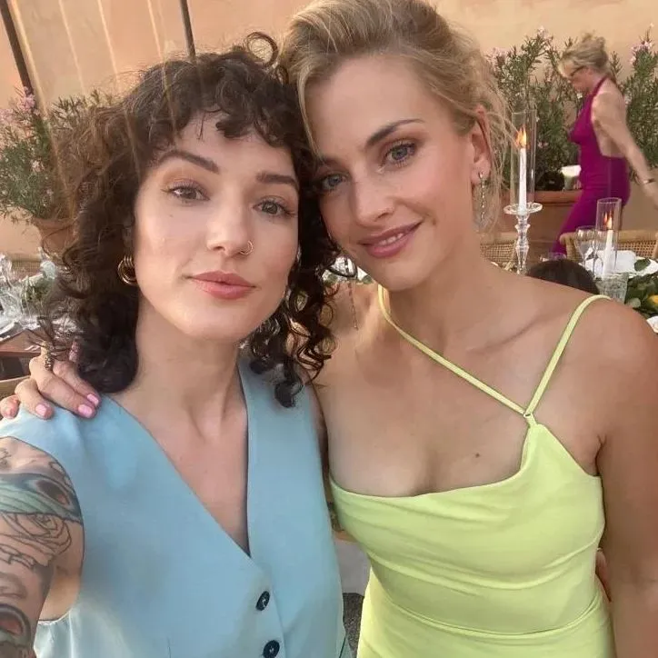 stefanie with her girlfriend at an wedding event